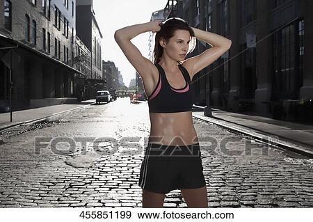 Woman exercising View Large Photo Image Stock Photo - Woman exercising. Fotosearch