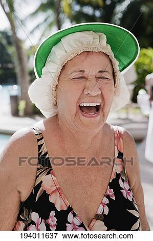 Woman laughing at the poolside, Biltmore Hotel, Coral Gables, Florida, USA View Large Photo Image Stock Photo - Woman laughing at the poolside, Biltmore Hotel, Coral Gables, Florida, USA. Fotosearch