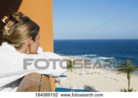 Woman looking at the sea view through a hotel's balcony, Cabo San Lucas, Mexico View Large Photo Image Stock Image - Woman looking at the sea view through a hotel's balcony, Cabo San Lucas, Mexico. Fotosearch