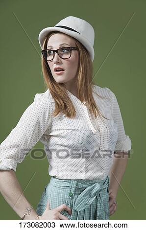 Woman looking over her shoulders View Large Photo Image Stock Image - Woman looking over her shoulders. Fotosearch