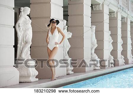 Woman posing at the poolside, Biltmore Hotel, Coral Gables, Florida, USA View Large Photo Image Stock Photo - Woman posing at the poolside, Biltmore Hotel, Coral Gables, Florida, USA. Fotosearch