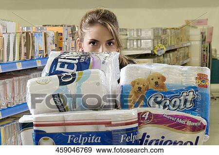 Woman shopping in a supermarket View Large Photo Image Stock Photo - Woman shopping in a supermarket. Fotosearch