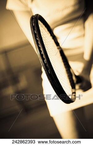 Woman's hand holding a tennis racket View Large Photo Image Stock Image - Woman's hand holding a tennis racket. Fotosearch