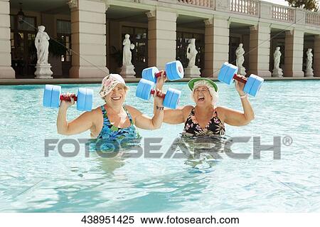 Women having fun in a swimming pool, Biltmore Hotel, Coral Gables, Florida, USA View Large Photo Image Stock Photography - Women having fun in a swimming pool, Biltmore Hotel, Coral Gables, Florida, USA. Fotosearch