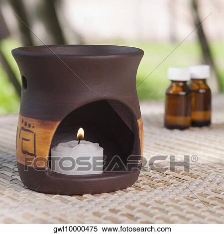 Aromatherapy burner with aromatherapy oil bottles View Large Photo Image Stock Photography - Aromatherapy burner with aromatherapy oil bottles. Fotosearch