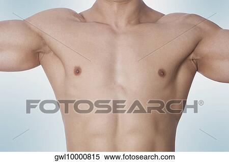 Close-up of a bare chested man View Large Photo Image Stock Photography - Close-up of a bare chested man. Fotosearch