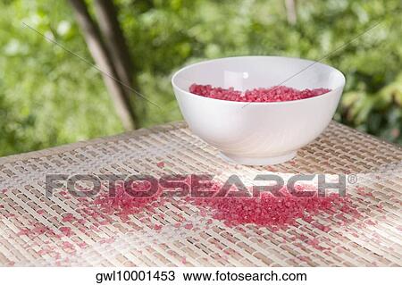 Stock Image - Close-up of a bowl of bath salt. Fotosearch