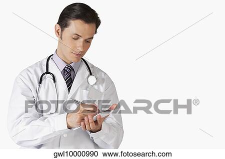Close-up of a doctor doing paperwork View Large Photo Image Stock Image - Close-up of a doctor doing paperwork. Fotosearch