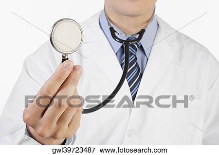 Close-up of a doctor holding a stethoscope View Large Photo Image Stock Photo - Close-up of a doctor holding a stethoscope. Fotosearch