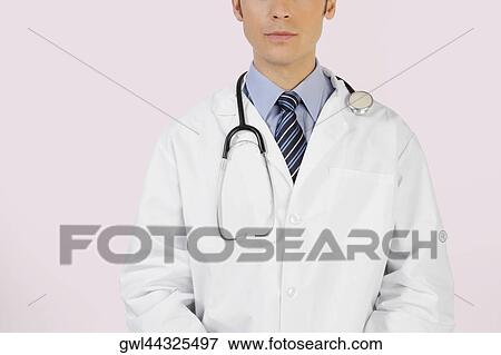Close-up of a doctor with a stethoscope View Large Photo Image Stock Photo - Close-up of a doctor with a stethoscope. Fotosearch
