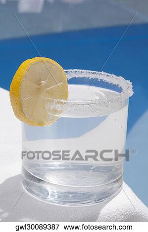 Close-up of a glass of lemonade View Large Photo Image Stock Photo - Close-up of a glass of lemonade. Fotosearch