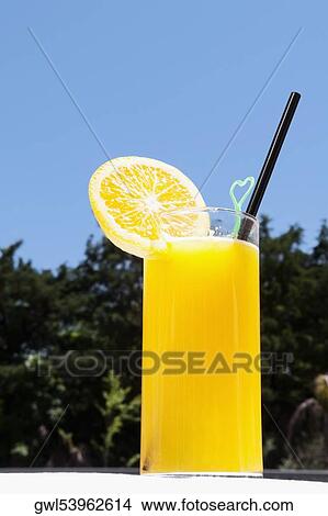 Close-up of a glass of orange juice View Large Photo Image Picture - Close-up of a glass of orange juice. Fotosearch