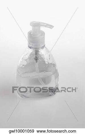 Stock Photo - Close-up of a liquid soap dispenser. Fotosearch