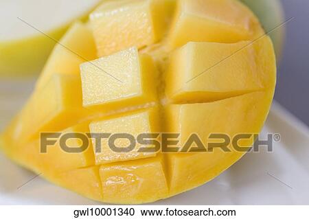 Close-up of a slice of mango View Large Photo Image Stock Image - Close-up of a slice of mango. Fotosearch