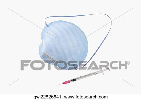 Close-up of a syringe and a swine flu mask View Large Photo Image Stock Image - Close-up of a syringe and a swine flu mask. Fotosearch