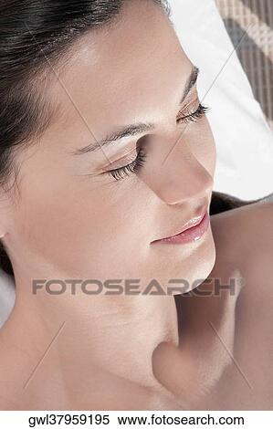 Stock Photography - Close-up of a woman on a massage table. Fotosearch