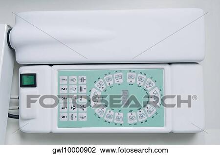 Stock Image - Close-up of an electronic dental scaler. Fotosearch