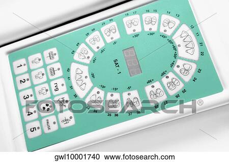 Stock Image - Close-up of an electronic dental scaler. Fotosearch