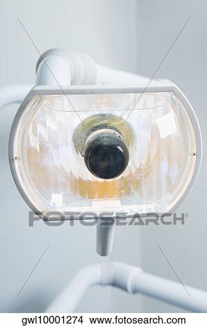 Close-up of an examination light in a dentist office View Large Photo Image Picture - Close-up of an examination light in a dentist office. Fotosearch