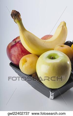 Close-up of assorted fruits View Large Photo Image Stock Photo - Close-up of assorted fruits. Fotosearch