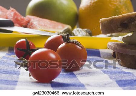 Close-up of cherry tomatoes View Large Photo Image Stock Photograph - Close-up of cherry tomatoes. Fotosearch