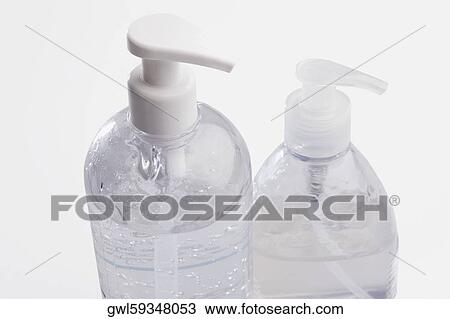 Close-up of liquid soap dispensers View Large Photo Image Stock Image - Close-up of liquid soap dispensers. Fotosearch