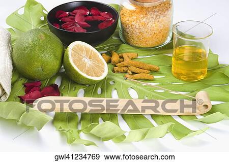 Close-up of turmeric with body oils and scrubs View Large Photo Image Stock Photo - Close-up of turmeric with body oils and scrubs. Fotosearch