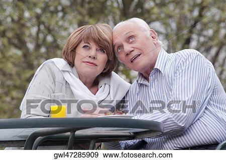 Stock Photo - Couple day dreaming in a rehabilitation center. Fotosearch