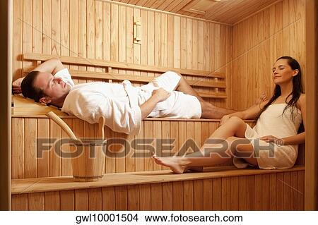 Picture - Couple taking a sauna bath. Fotosearch