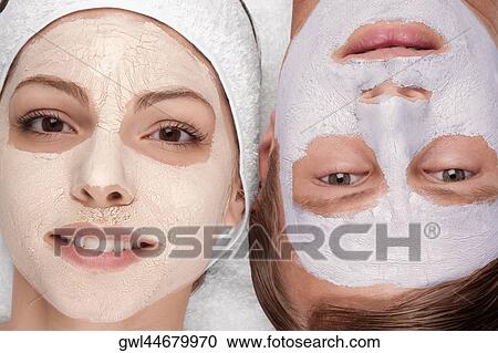 Couple with face pack on their faces View Large Photo Image Stock Image - Couple with face pack on their faces. Fotosearch