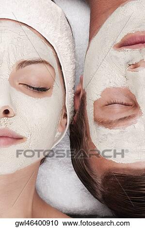 Couple with face pack on their faces View Large Photo Image Stock Image - Couple with face pack on their faces. Fotosearch