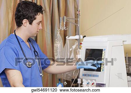 Doctor working on a cardiac monitor screen View Large Photo Image Stock Image - Doctor working on a cardiac monitor screen. Fotosearch