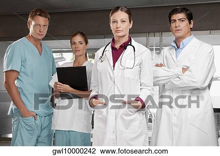 Doctors standing together View Large Photo Image Stock Image - Doctors standing together. Fotosearch