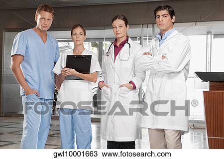 Doctors standing together View Large Photo Image Stock Image - Doctors standing together. Fotosearch