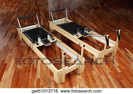 Exercise machines in a gym View Large Photo Image Stock Photograph - Exercise machines in a gym. Fotosearch