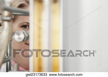 Female doctor researching in a laboratory View Large Photo Image Stock Image - Female doctor researching in a laboratory. Fotosearch