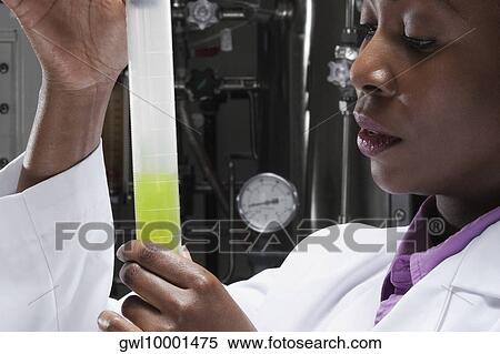 Female doctor researching in a laboratory View Large Photo Image Stock Photography - Female doctor researching in a laboratory. Fotosearch