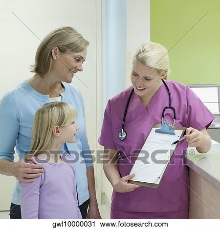 Female doctor showing medical chart to patients View Large Photo Image Stock Image - Female doctor showing medical chart to patients. Fotosearch