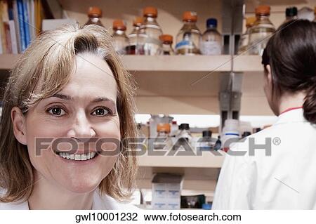 Female doctors working in a laboratory View Large Photo Image Stock Image - Female doctors working in a laboratory. Fotosearch
