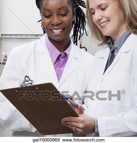 Female doctors working in a laboratory View Large Photo Image Stock Photo - Female doctors working in a laboratory. Fotosearch
