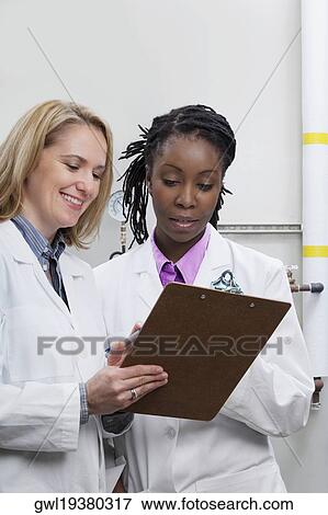 Female doctors working in a laboratory View Large Photo Image Stock Photo - Female doctors working in a laboratory. Fotosearch