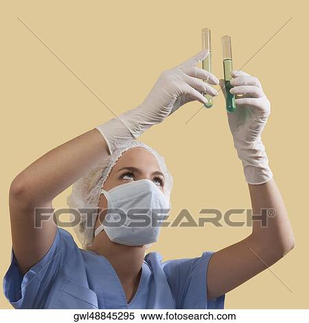 Female lab technician analyzing test tubes View Large Photo Image Stock Photography - Female lab technician analyzing test tubes. Fotosearch