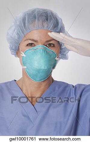 Female surgeon saluting View Large Photo Image Stock Image - Female surgeon saluting. Fotosearch