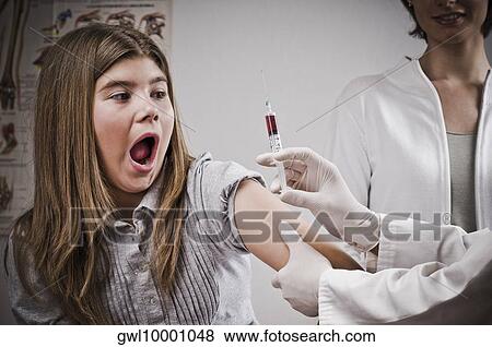 Girl fearing injection View Large Photo Image Stock Photo - Girl fearing injection. Fotosearch