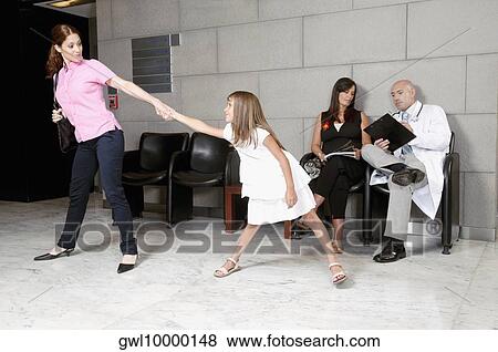 Girl pulling her mother's hand in a hospital View Large Photo Image Stock Photo - Girl pulling her mother's hand in a hospital. Fotosearch