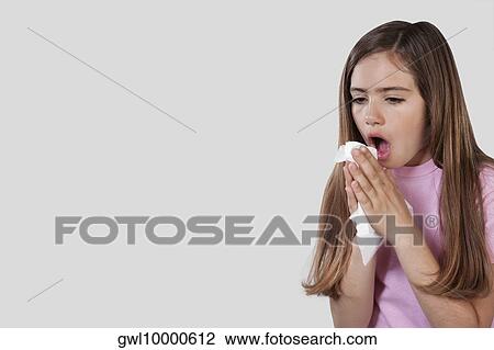 Girl suffering from cold View Large Photo Image Stock Image - Girl suffering from cold. Fotosearch