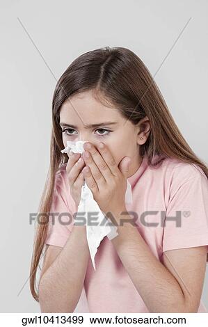 Girl suffering from cold View Large Photo Image Stock Photo - Girl suffering from cold. Fotosearch