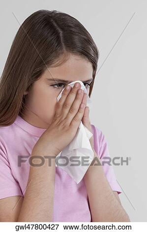 Girl suffering from cold View Large Photo Image Stock Photo - Girl suffering from cold. Fotosearch