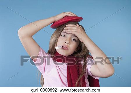 Girl taking her temperature and applying ice pack View Large Photo Image Stock Image - Girl taking her temperature and applying ice pack. Fotosearch