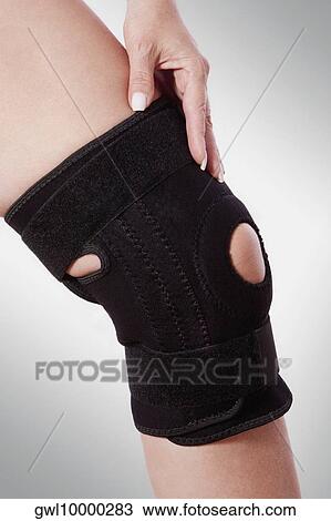 Knee brace on a person's knee View Large Photo Image Stock Image - Knee brace on a person's knee. Fotosearch